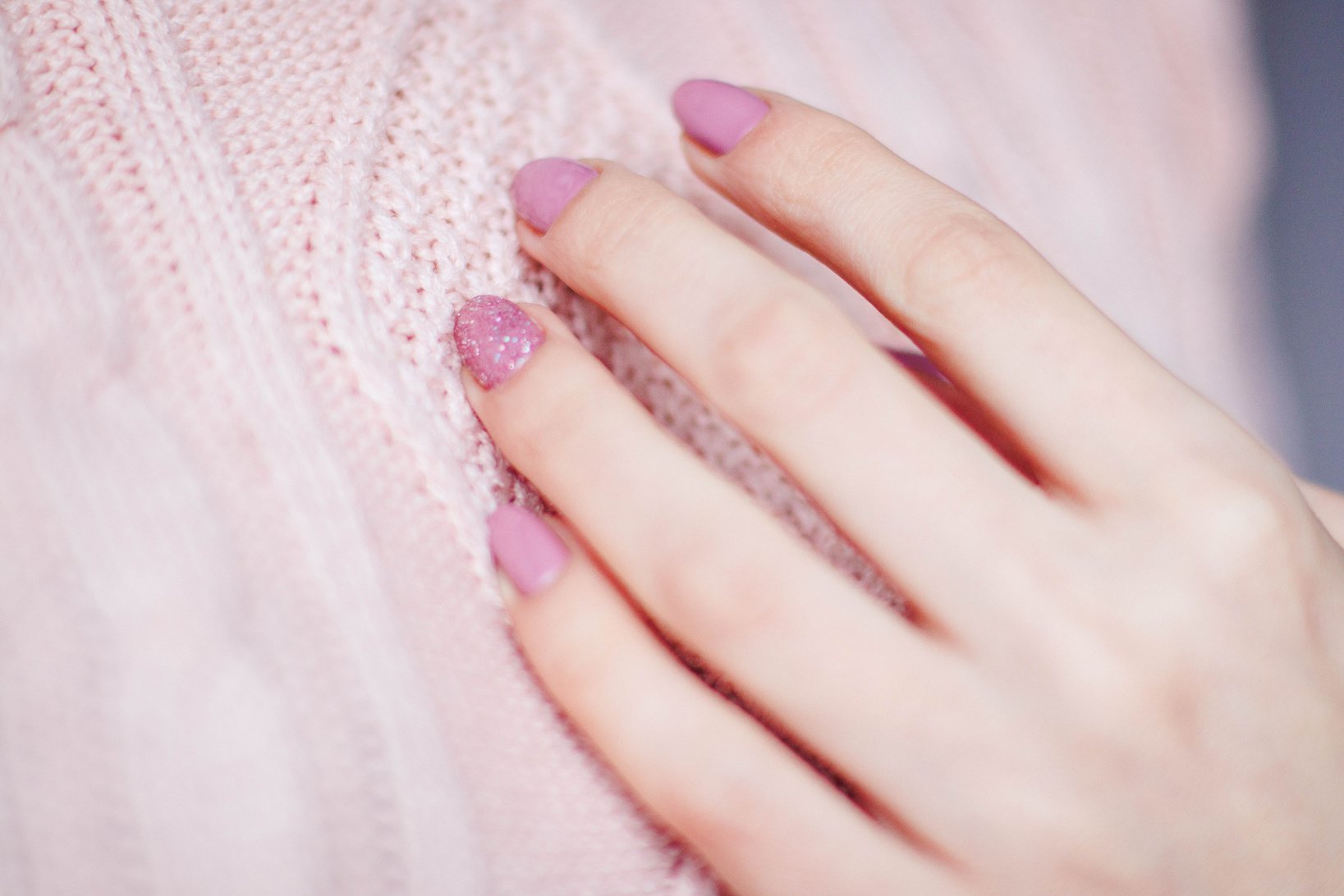 Woman With Pink Manicure